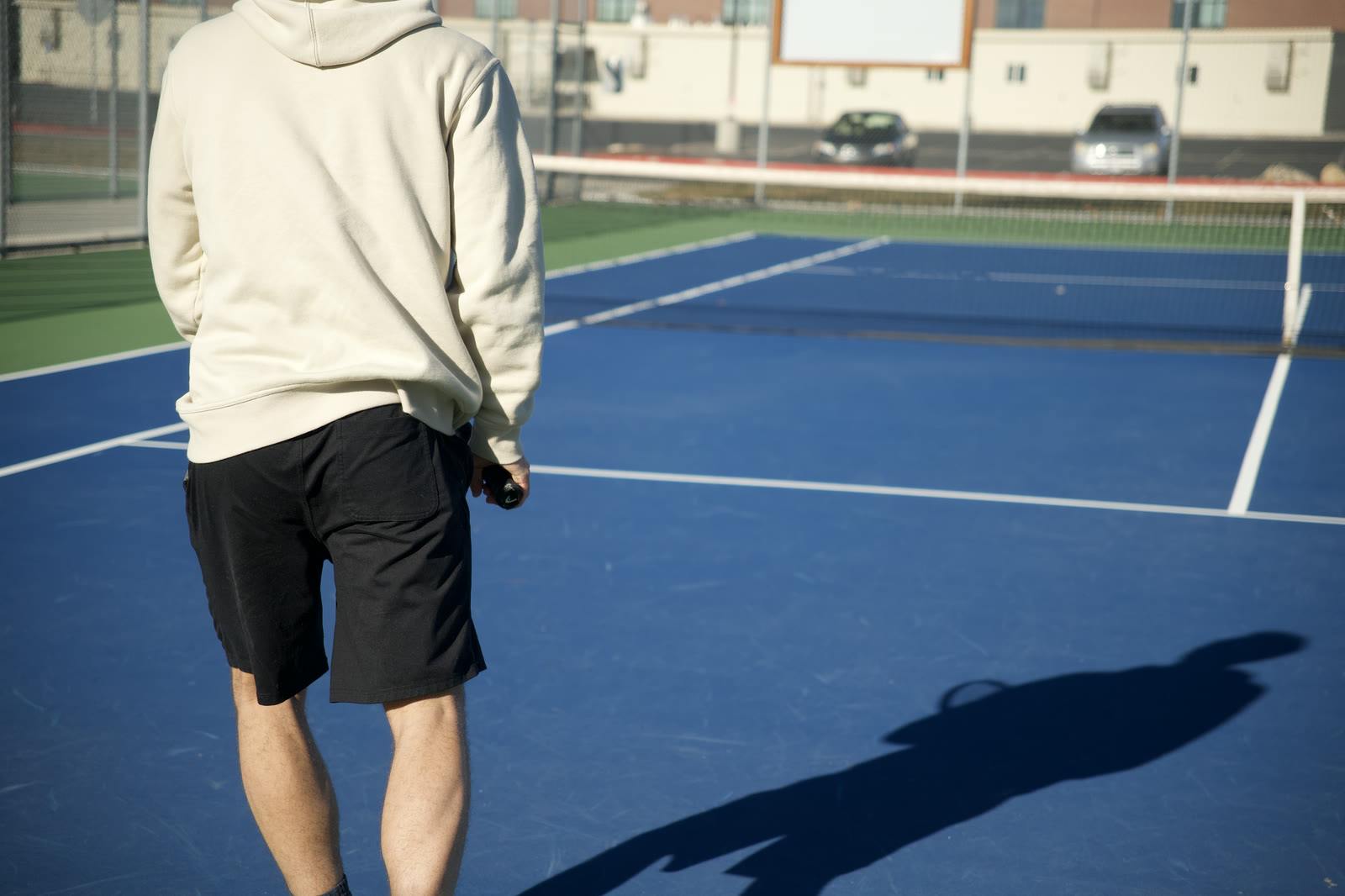 Walking the baseline between points on an empty court